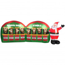 Home Accents Holiday 10.99 ft. W Pre-lit LED Inflatable Santa in Stable with 8 Reindeers Airblown