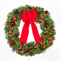 Home Accents Holiday 48 in. Pre-Lit LED Artificial Christmas Wreath with red ornaments and a velvet bow
